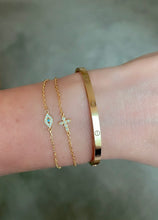 Petite gold cross bracelet